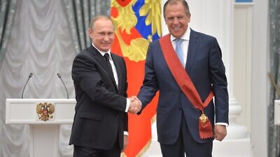 Russia's President Vladimir Putin and Foreign Minister Sergey Lavrov, as the latter is awarded the Order of Service to the Fatherland, 1st class, at the Kremlin in Moscow, May 21, 2015. Credit: Kremlin Presidential Press and Information Office via Wikimedia Commons.