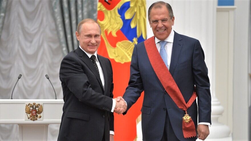 Russian President Vladimir Putin with Russia's Foreign Minister Sergey Lavrov being awarded the Order of Service to the Fatherland, 1st class, at the Kremlin in Moscow on May 21, 2015. Credit: Kremlin Presidential Press and Information Office via Wikimedia Commons.