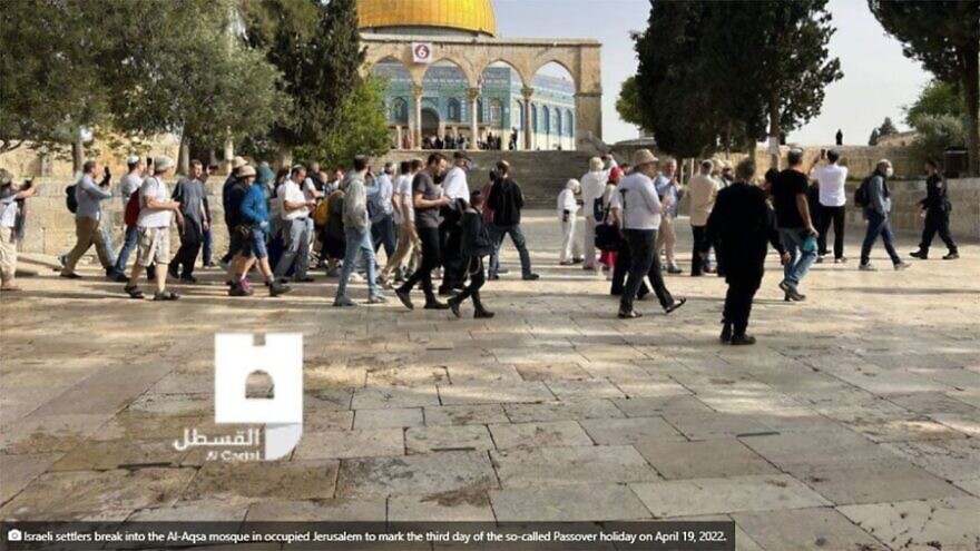 A Jewish group tours the Temple Mount under police supervision. Note the 'Al-Quds' caption claiming they were “breaking into the Al-Aqsa mosque” on the “so-called Passover holiday.” Source: Al-Quds.