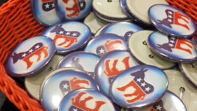 Lapel buttons with stylized Democratic party donkey symbol. Photo by U.S. Consulate General Barcelona