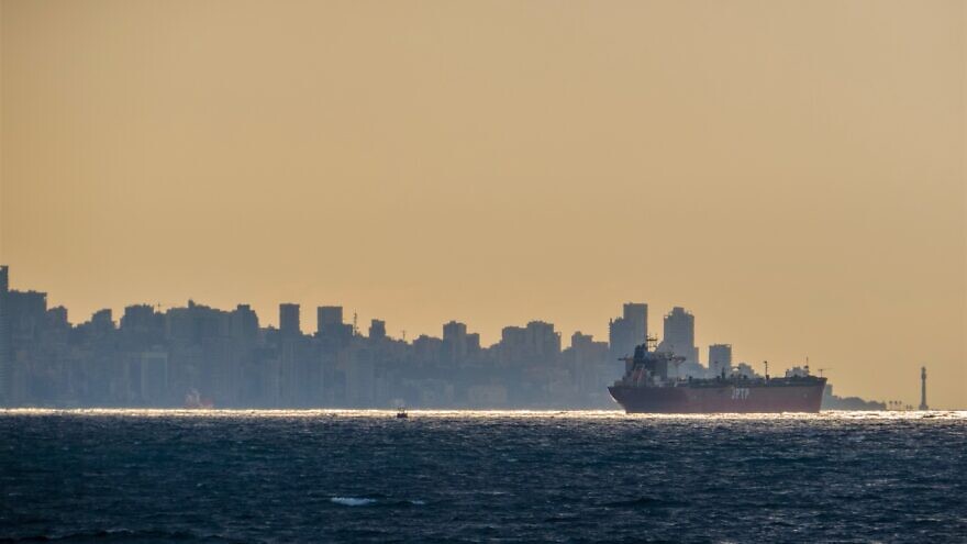 Beirut and its port as seen off-shore from the sea. Credit: Shutterstock/Diego Fiore.