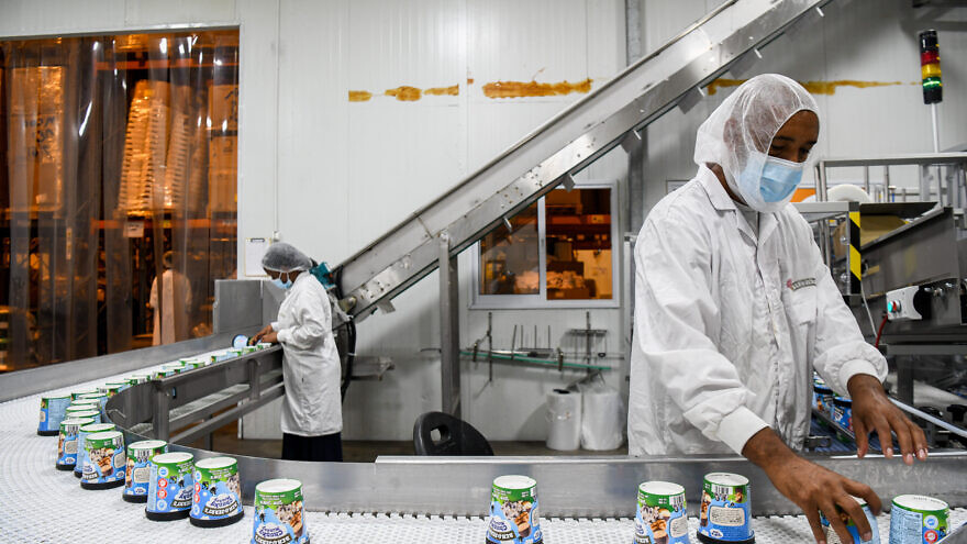 Workers at the Ben and Jerry's Israel factory near Kiryat Malachi, July 21, 2021. Photo by Flash90.
