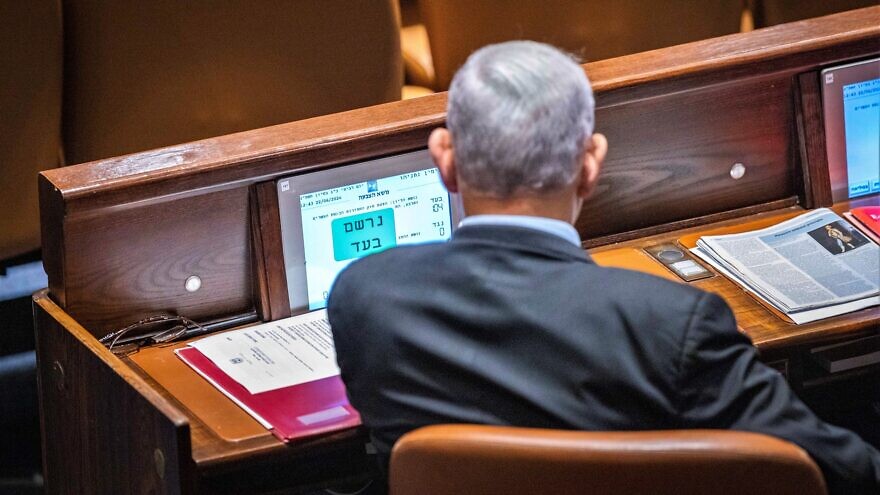 Leader of the opposition and head of the Likud Party Benjamin Netanyahu during a vote on the bill to dissolve the 24th Knesset in Jerusalem, June 22, 2022. Photo by Olivier Fitoussi/Flash90.