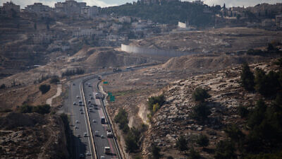 View of Route 1, the Maaleh Adumim-Jerusalem road, from the West Bank area known as E1, with Jerusalem's Mount Scopus seen on the horizon, on Dec. 10, 2019. Photo by Hadas Parush/Flash90.