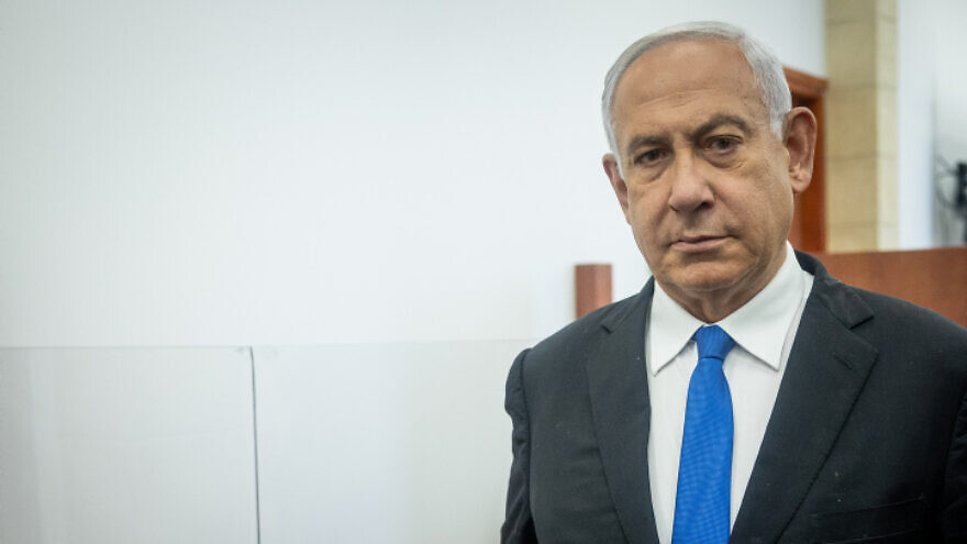 Former Israeli prime minister Benjamin Netanyahu arrives at the District Court in Jerusalem for a hearing on May 31, 2022. Photo by Yonatan Sindel/Flash90.