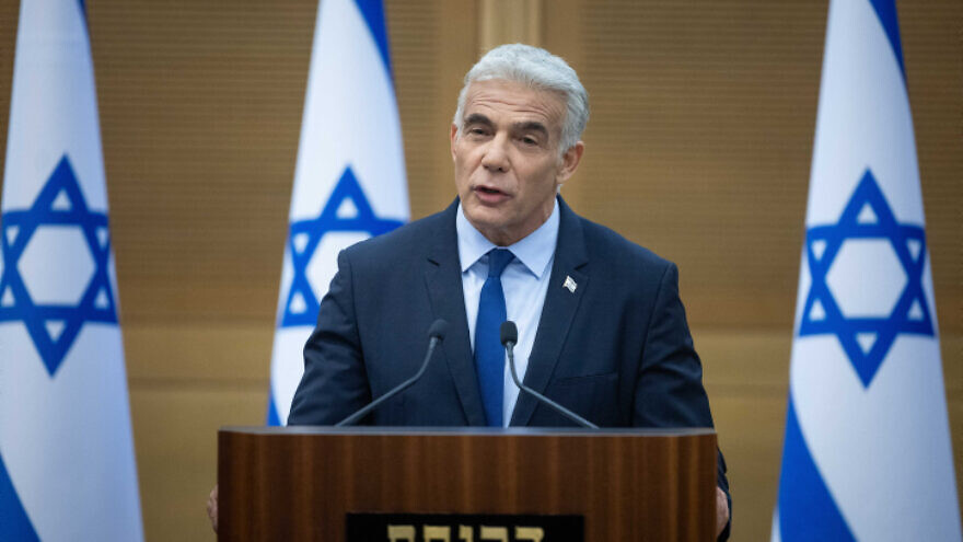Israeli Foreign Minister Yair Lapid speaks at a joint press conference with Israeli Prime Minister Naftali Bennett at the Knesset in Jerusalem on June 20, 2022. Photo by Yonatan Sindel/Flash90.