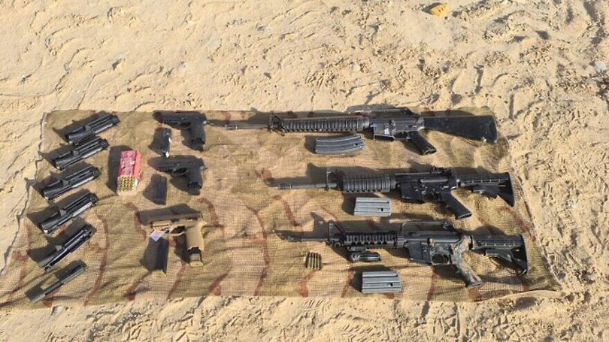 Smuggled weapons and ammunition seized by the Israel Defense Forces in the Dead Sea area on May 22, 2022. Credit: Israel Defense Forces.