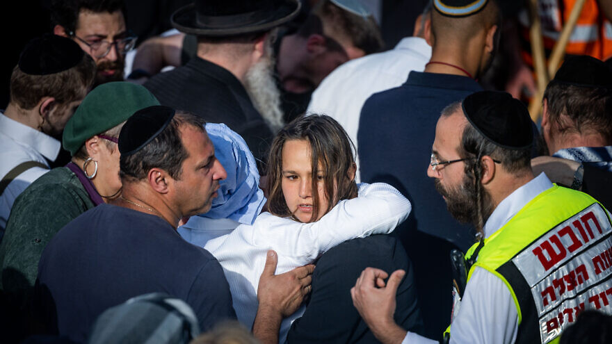 Victoria Fligelman at the funeral of her fiancée, Vyacheslav Golev, 23, who was shot dead by terrorists during his shift as a security guard outside Ariel on May 1, 2022. Photo by Yonatan Sindel/Flash90.