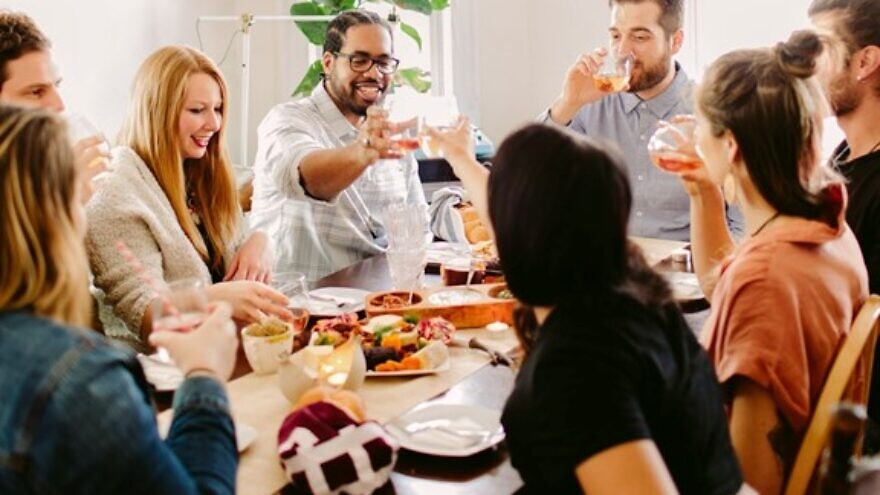 Getting together on Friday nights appeals to more and more Jewish men and women in their 20s and 30s, according to a survey by OneTable. Credit: Courtesy.