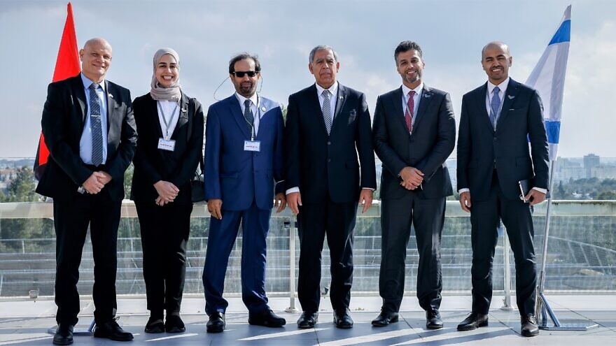 Ali Rashid al-Nuaimi (third from left), chairman of the Defense, Interior and Foreign Affairs Committee in the United Arab Emirates; Chairman of the Israeli parliament Mickey Levy (third from right); and a delegation of members of the United Arab Emirates parliament at the Knesset in Jerusalem on Feb. 7, 2022. Photo by Olivier Fitoussi/Flash90.