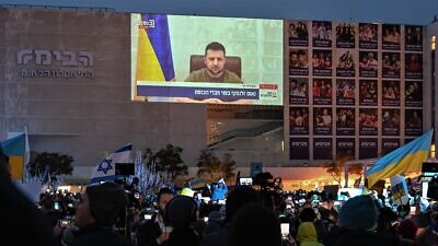 A rally in support of Ukraine at Habima Square in Tel Aviv with a broadcast of Ukrainian President Volodymyr Zelenskyy as he appeals to Israel a month after the start of Russia's war on Ukraine, March 20, 2022. Credit: Israfoto/Shutterstock.