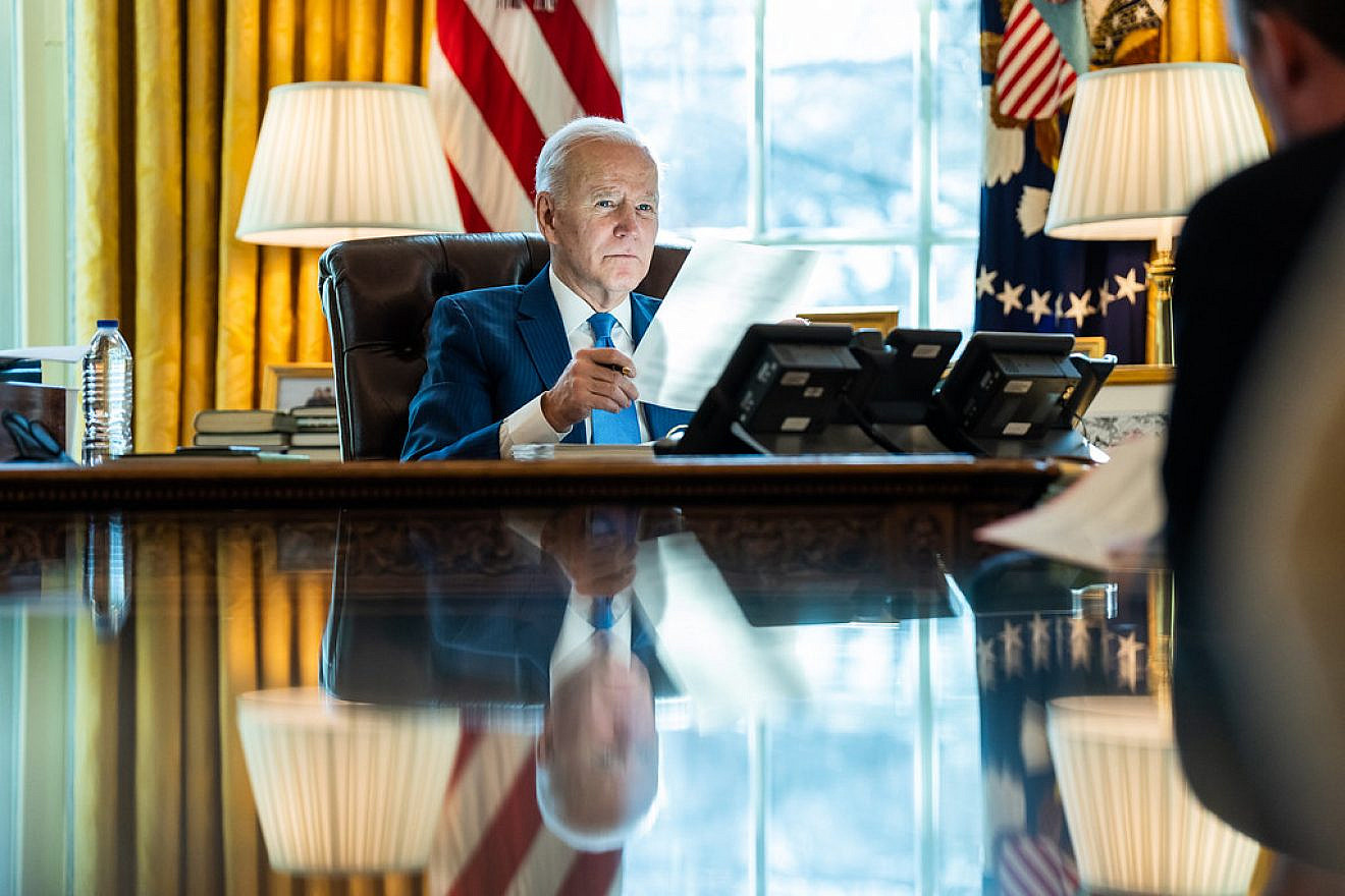 U.S. President Joe Biden talks on the phone with King Salman of Saudi Arabia on Feb. 9, 2022, in the Oval Office of the White House. Credit: Adam Schultz/White House.