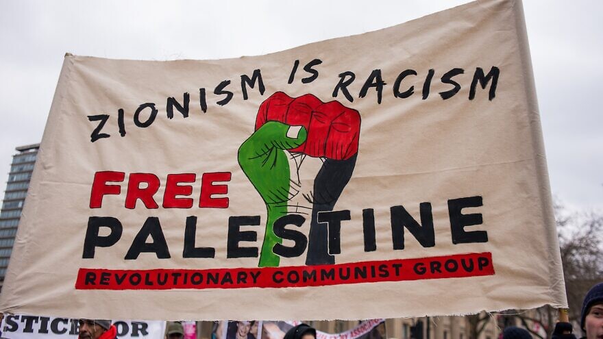 One of the larger banners and posters seen at the March Against Racism national demonstration in London, in protest of the dramatic rise in race-related attacks, March 17, 2018. Credit: John Gomez/Shutterstock.