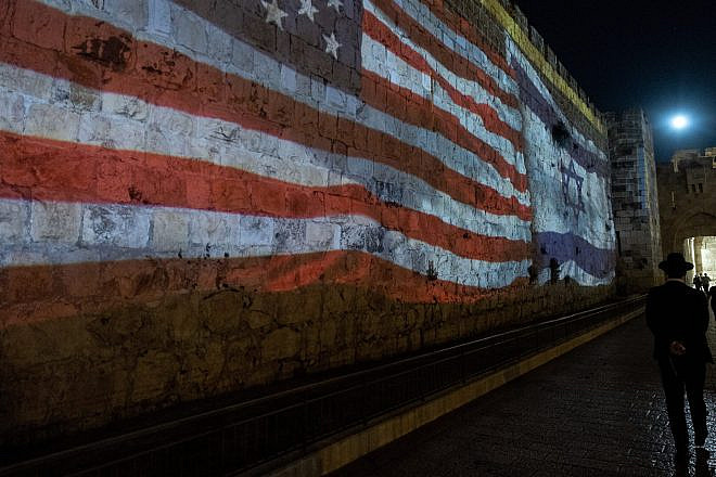 The American and Israeli flags are screened on the walls of Jerusalem's Old City as a welcome to U.S. President Joe Biden on July 13, 2022. Photo by Yonatan Sindel/Flash90.