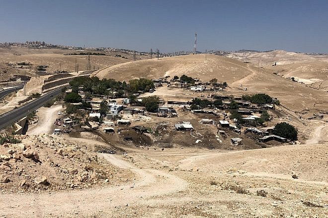The illegal Bedouin village of Khan al-Ahmar, on Highway 1 between Jerusalem and the Dead Sea. Photo by Josh Hasten.
