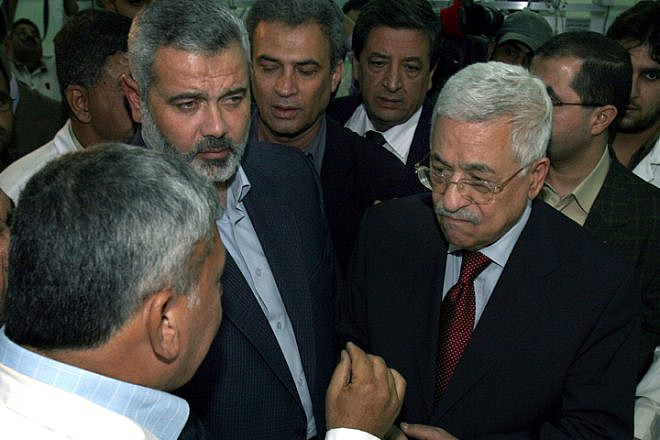 Hamas Prime Minister Ismail Haniyeh (left) and Palestinian Authority leader Mahmoud Abbas visit Odwan Hospital in the northern Gaza Strip, Nov. 8, 2006. Photo by Ahmad Khateib/Flash90.