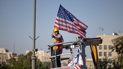 American flags being hung in Jerusalem ahead of U.S. President Biden's visit, July 10, 2022. Photo by Yonatan Sindel/Flash90.