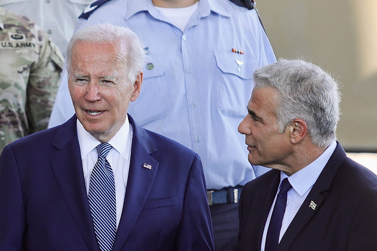 U.S. President Joe Biden and Israeli Prime Minister Yair Lapid review some of Israel's advanced air-defense systems after Biden's arrival at Ben-Gurion Airport, near Tel Aviv, on July 13, 2022. Photo by Marc Israel Sellem/POOL.