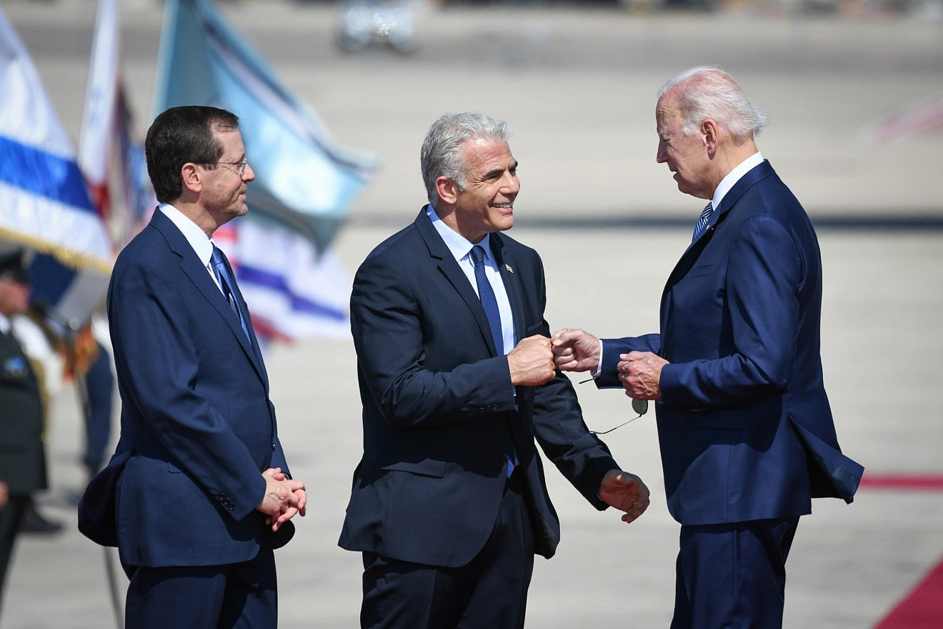 U.S. President Joe Biden, Israeli Prime Minister Yair Lapid and President Isaac Herzog at a welcoming ceremony for Biden at Ben Gurion Airport near Tel Aviv on July 13, 2022. Photo: Sraya Diamant
/Flash90