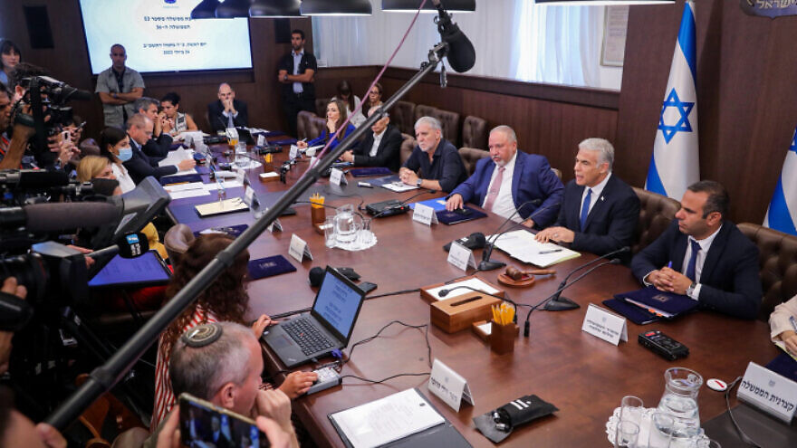 Israeli Prime Minister Yair Lapid leads the weekly Cabinet meeting, at the Prime Minister's Office in Jerusalem on July 24, 2022. Photo by Marc Israel Sellem/POOL.