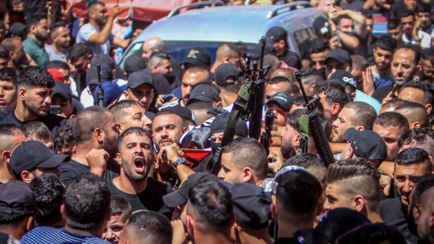 Palestinian terrorists attend the funerals of Mohammad Bashar al-Azizi and Abderrahman Jamal Soboh, who were killed in clashes with Israeli security forces, in Nablus, on July 24, 2022. Photo by Nasser.