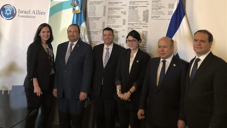 From left: President of the Jewish Community of Guatemala Rebeca Permuth; Guatemala Minister of Foreign Affairs Mario Bucaro; Josh Reinstein, president of the Israel Allies Foundation; Consul of Israel in Guatemala Annaëlle Bensoussan; Deputy Fidel Reyes Lee, chairman of the Israel Allies Caucus in Guatemala; and Leopoldo Martinez, Israel Allies Foundation Latin America director at an event in Guatemala on July 11, 2022. Credit: Courtesy.
