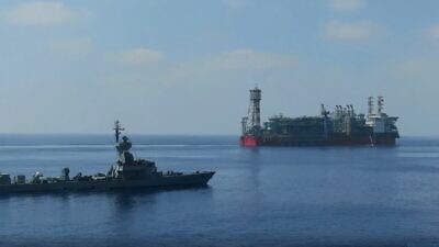 An Israeli warship sails near one of Israel's offshore natural gas rigs. Photo courtesy  of the IDF Spokesperson's Unit.