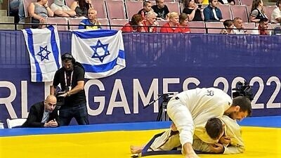 Israel’s Nimrod Ryeder starts his journey toward gold, defeating Poland’s Robert Henek in jiu-jitsu at the World Games in Birmingham, Ala., on July 15, 2022. Photo by Larry Brook.
