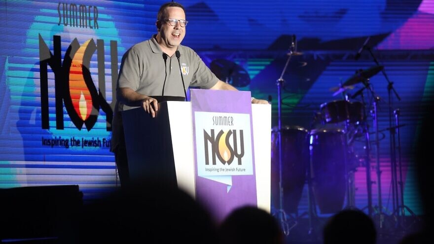 International director Rabbi Micah Greenland speaks at Yom NCSY in Israel. Credit: NCSY.
