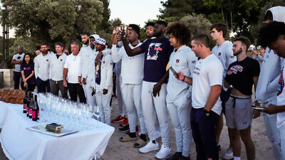 Auburn University's men's basketball team brings in the Sabbath in Jerusalem on Friday, July 31, 2022. The team is in Israel for its “Birthright for College Basketball” initiative. Credit: Auburn Athletics.