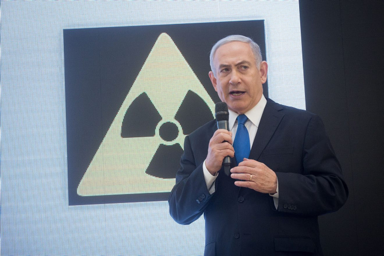 Then-Prime Minister Benjamin Netanyahu presents a trove of Iranian documents on Tehran's nuclear program at a press conference in Tel Aviv, April 30, 2018. Photo by Miriam Alster/Flash90.