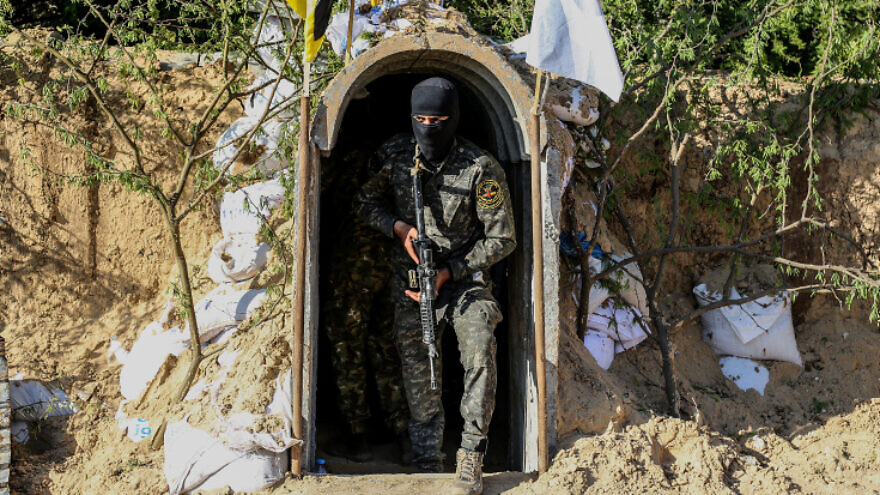 A Palestinian Islamic Jihad terrorist exits a tunnel in Beit Hanun in the Gaza Strip, on May 18, 2022. Photo by Attia Muhammed/Flash90.