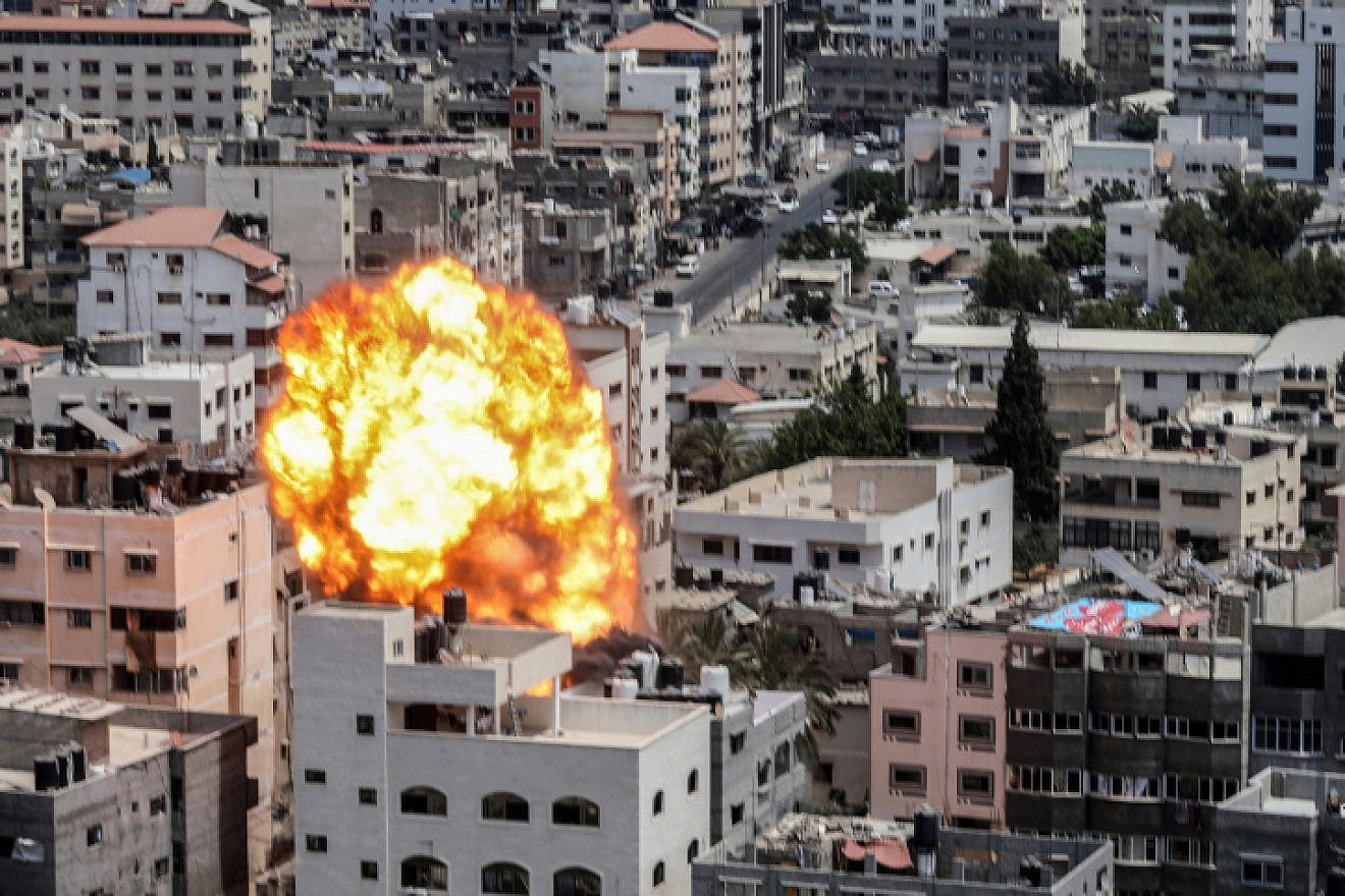 An Israeli air strike on a residential building in Gaza City used for storing weapons, Aug. 6, 2022. Photo by Attia Muhammed/Flash90.