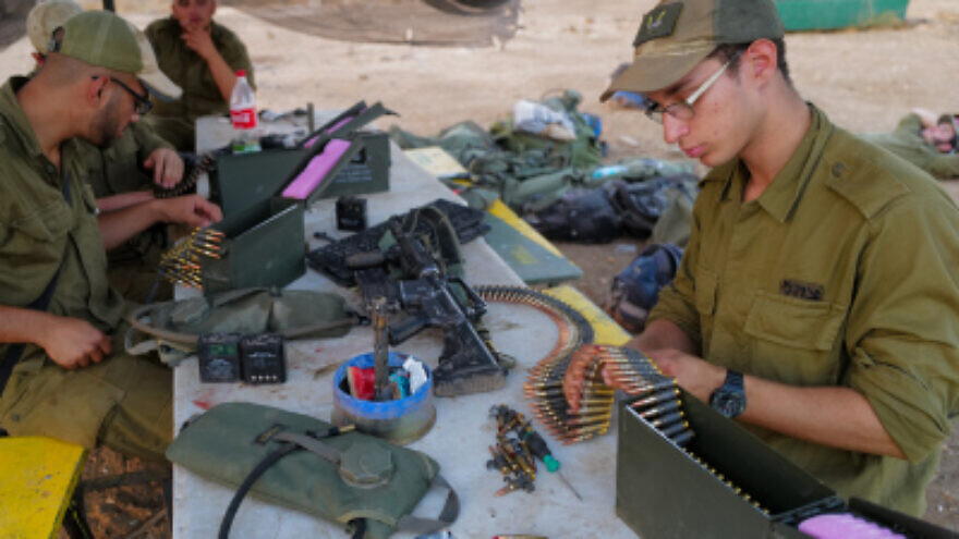 Sgt. Eitan Fichman (right) during a drill in the Golan Heights on Aug. 29, 2022. Photo by Michael Giladi/Flash90.