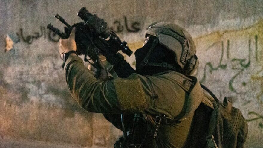 An Israeli soldier participates in a counter-terror operation in Judea and Samaria as part of the Israel Defense Forces' "Operation Breakwater," launched in March 2022 in response to a wave of deadly terror attacks. Credit: Israel Defense Forces.