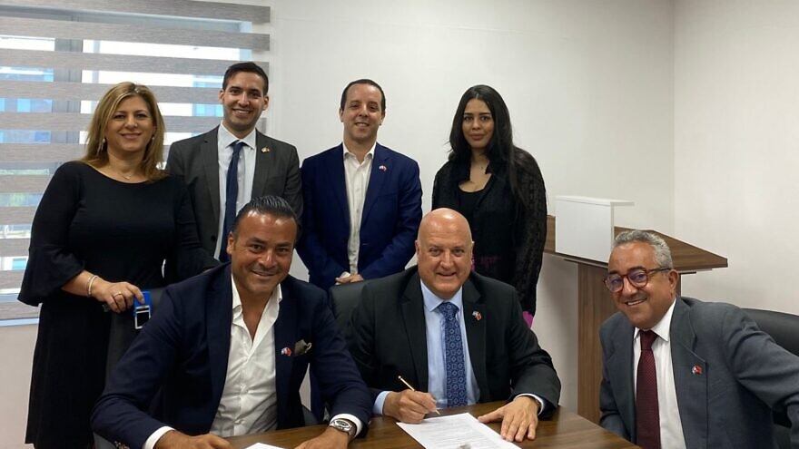 Israel's Ambassador in Morocco David Govrin (center) signs a contract to build an embassy in Rabat, Aug. 2, 2022. Source: Twitter/David Govrin.