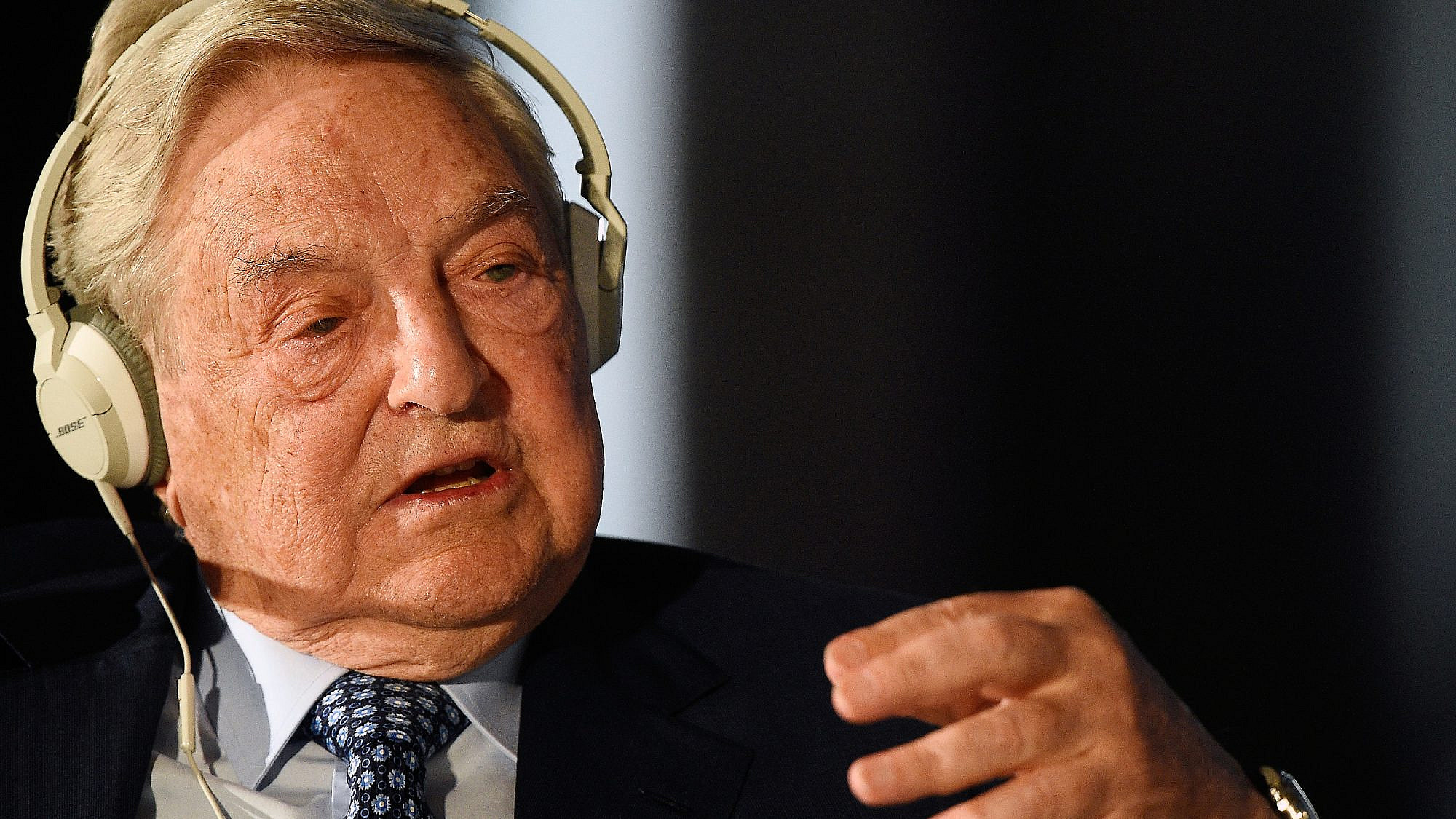 George Soros, the Hungarian-born American billionaire, investor and philanthropist, speaks during a political and financial meeting in Italy in 2014. Credit: Giacomo Morinini/Shutterstock.