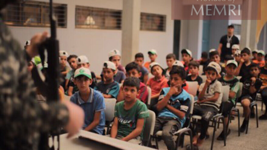 Young boys hear a lesson about weapons in a camp in Jebalia, July 25-28, 2022. Credit: MEMRI.