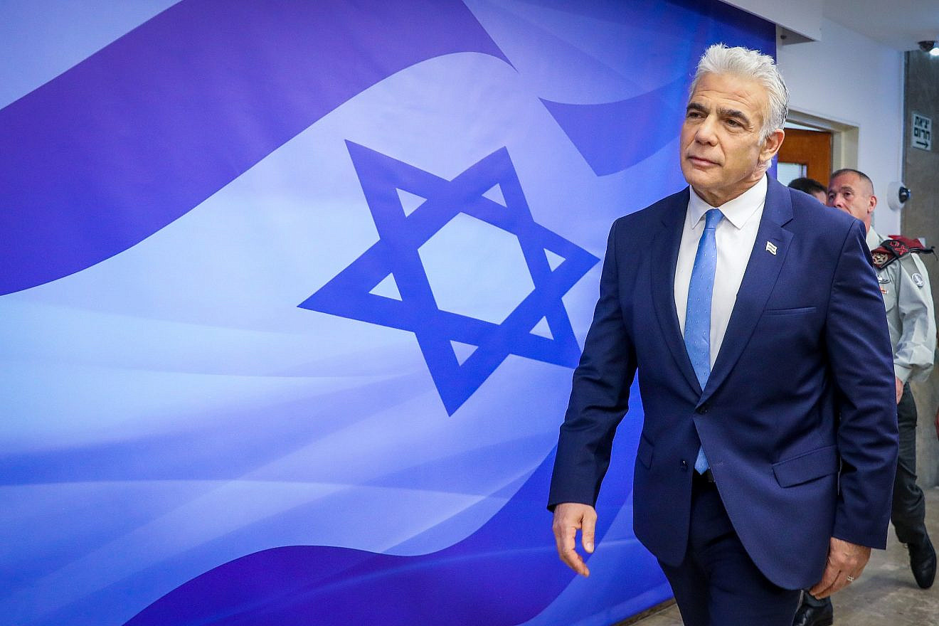 Israeli Prime Minister Yair Lapid arrives to a cabinet meeting at the Prime Minister's office in Jerusalem on July 31, 2022. Photo by Marc Israel Sellem/POOL.