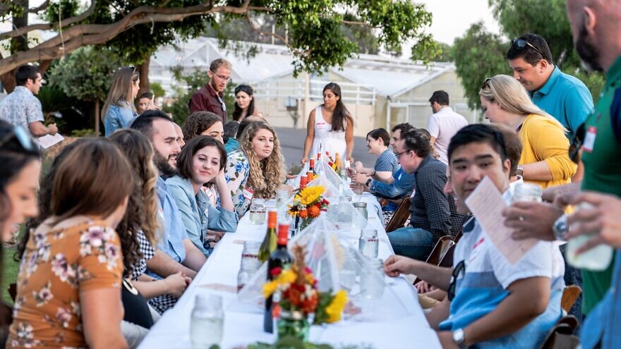 OneTable is making it possible for more young adults to host and "guest" Shabbat dinners. Credit: Courtesy.