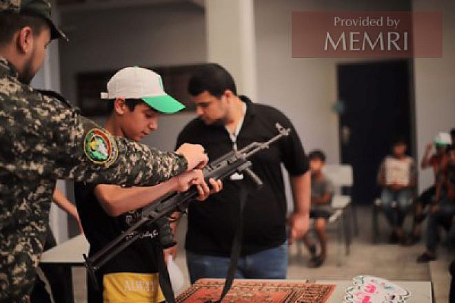 Palestinian children learn ow to handle rifles at youth summer camps, where they direct violence at Israel, July 25-28, 2022. Source: Facebook.com/gheras.alqud via MEMRI.