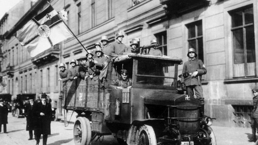 The Marine Brigade Erhardt during the Kapp Putsch in Berlin 1920 (it used the swastika as its symbol, as seen on their helmets and on the truck, which inspired the Nazi Party to adopt it as the movement's symbol). Credit: German Federal Archives via Wikimedia Commons.