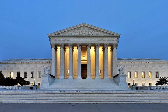 The western facade of the U.S. Supreme Court building at dusk in Washington, D.C. Credit: Joe Ravi via Wikimedia Commons.
