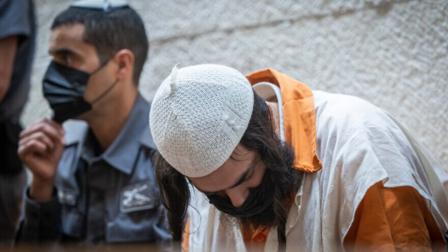 Amiram Ben-Uliel, accused of the Duma arson murders in July 2015, arrives to a court hearing on his appeal, at the Supreme Court in Jerusalem, on March 7, 2022. Photo by Yonatan Sindel/Flash90.