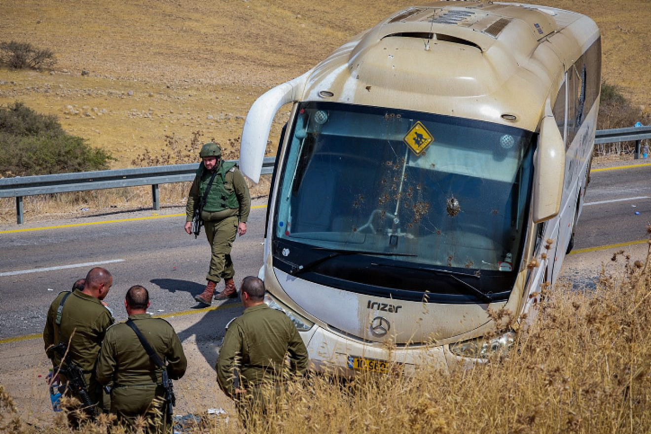 Israeli security forces at the scene of a shooting attack on a bus on Route 90 in the Jordan Valley, Sept. 4, 2022. Photo by Flash90.