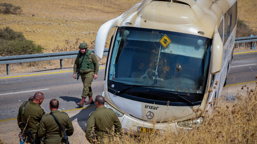 Israeli security forces at the scene of a shooting attack on a bus on Route 90 in the Jordan Valley, Sept. 4, 2022. Photo by Flash90.