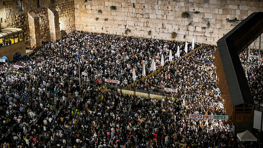 Jewish men praying for forgivness (Selichot), at the Western Wall in the Old City of Jerusalem, early on September 16, 2022, prior to the upcoming Jewish holiday of Rosh Hashana. Photo: Arie Leib Abrams/Flash90