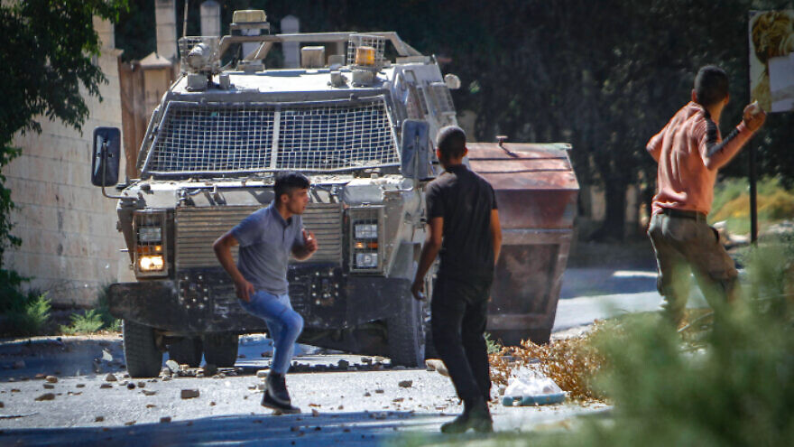 Palestinians clash with Israeli security forces in Jenin on Sept. 28, 2022. Photo by Nasser Ishtayeh/Flash90.