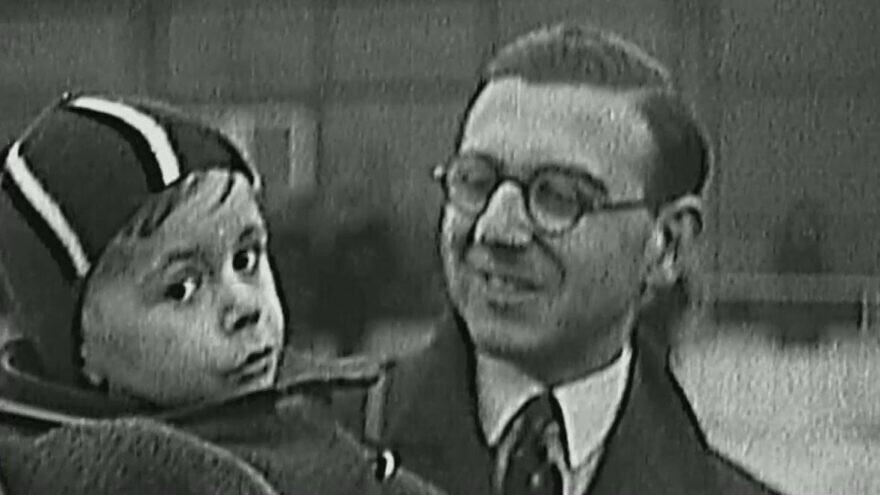 Trevor Chadwick with a child. Source: YouTube.
