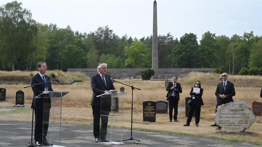 Israeli President Isaac Herzog and German counterpart Frank-Walter Steinmeier spent time honoring the Jewish dead on the grounds of the former Bergen-Belsen concentration camp on Sept. 7, 2022. Credit: Amos Ben Gershom/GPO.